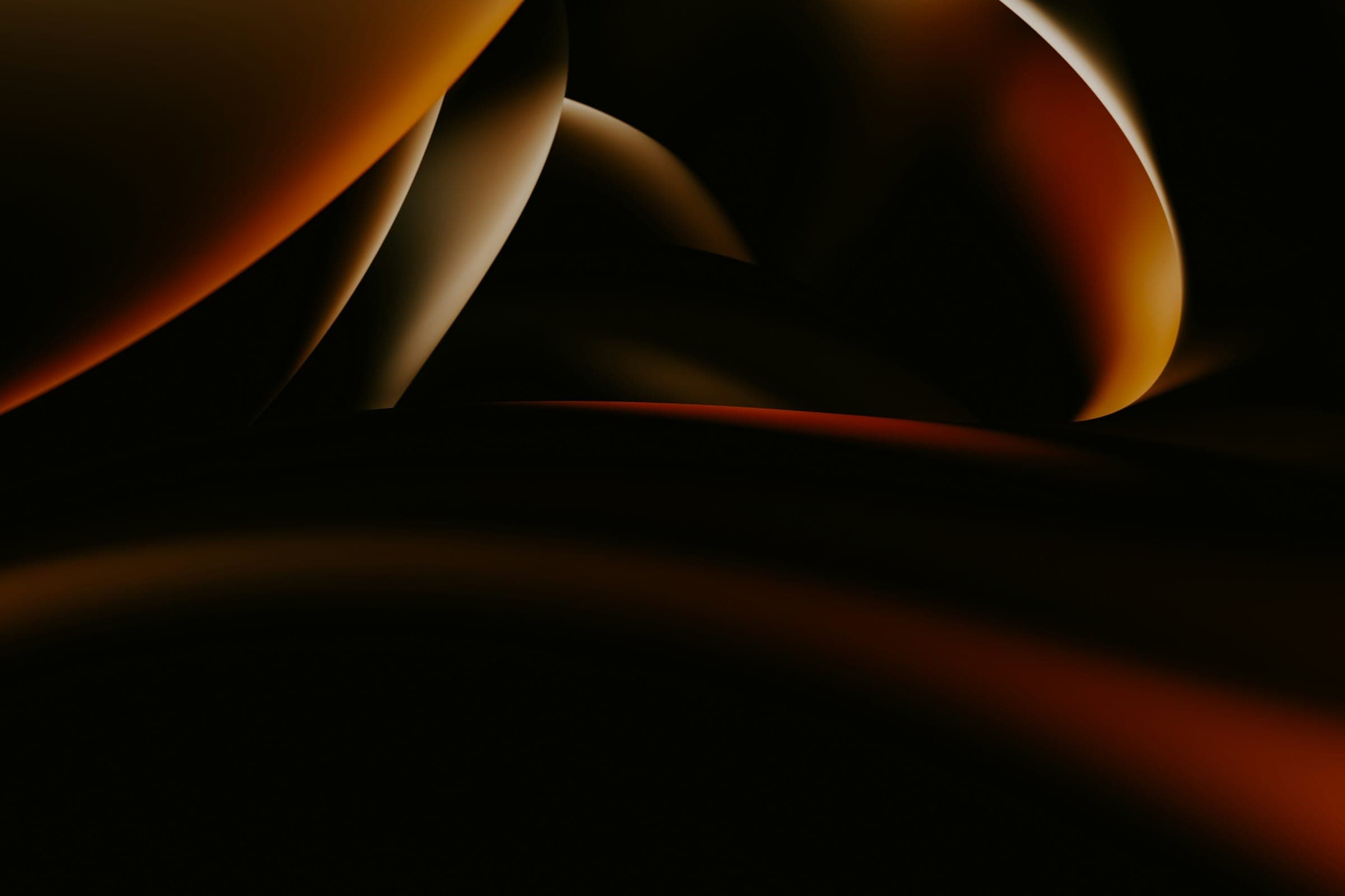 Abstract amber curves glowing against a dark background